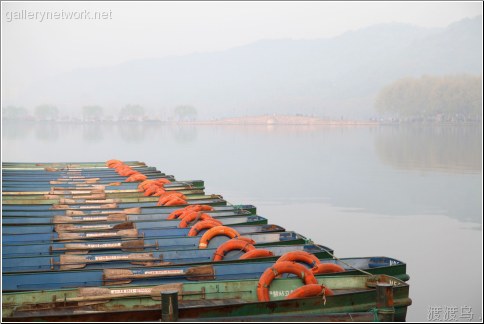 rowboats on lake