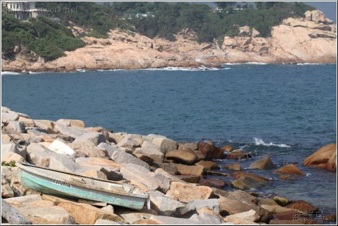 boat on the rocks