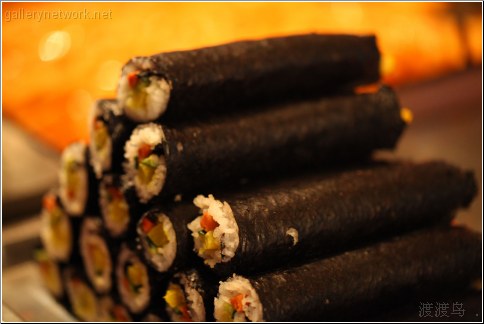 stacked sushi rolls