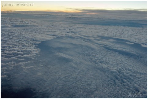 broken overcast aerial sunset