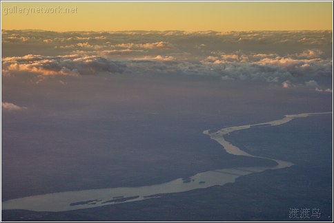 river below clouds